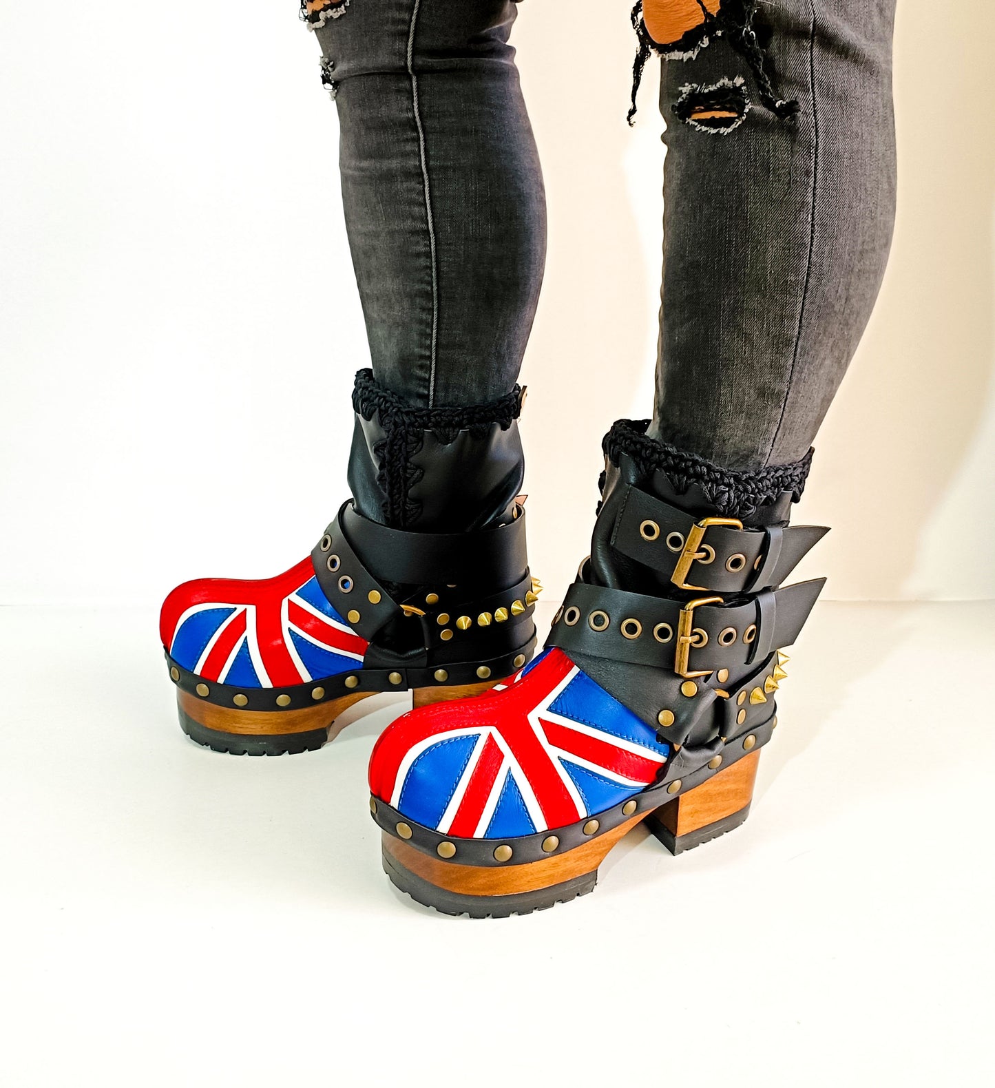 Biker style platform boots with England flag. Leather ankle boots with england flag, buckles and studs. High-end handmade footwear by Sol Caleyo.