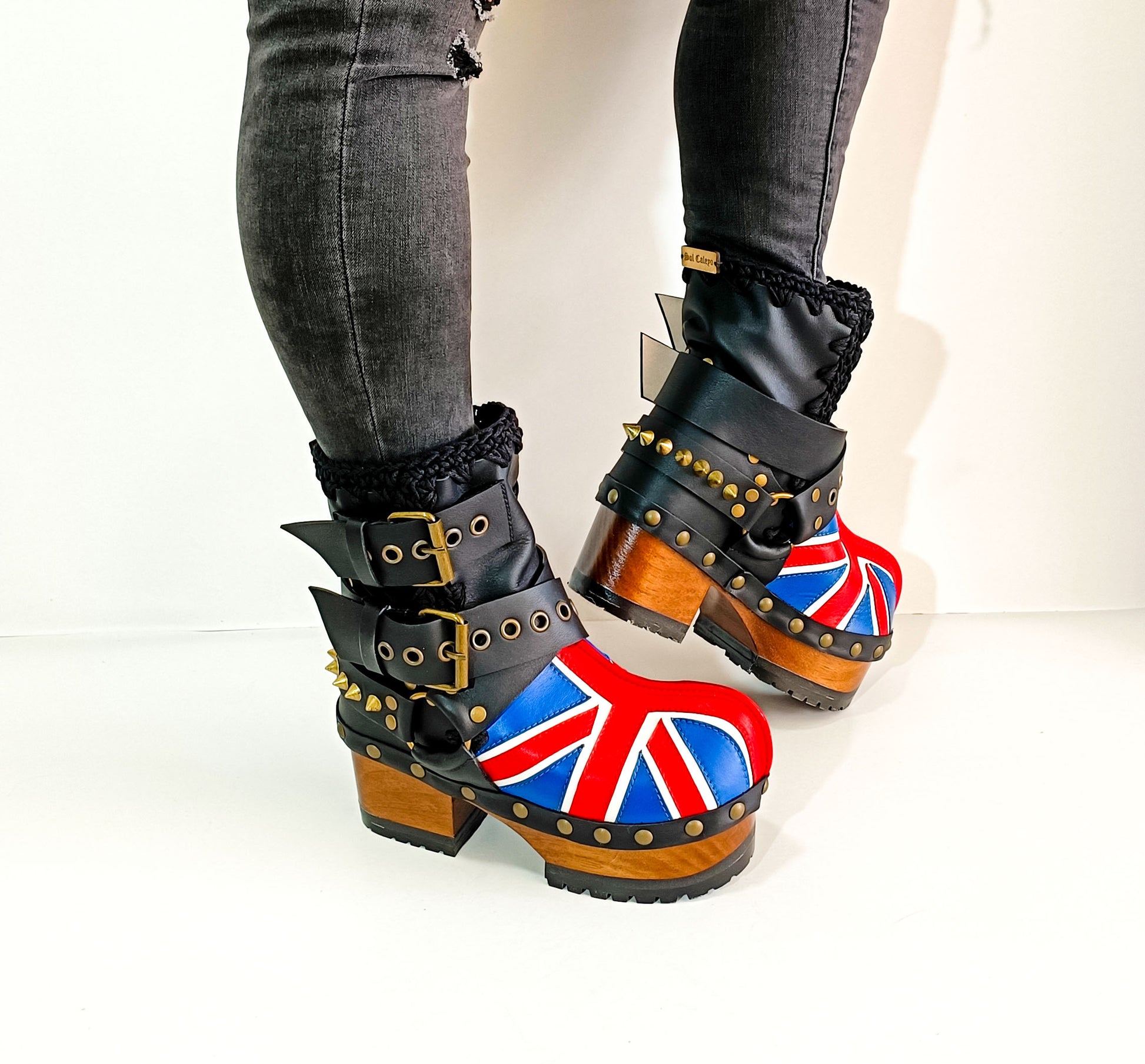 Biker style platform boots with England flag. Leather ankle boots with england flag, buckles and studs. High-end handmade footwear by Sol Caleyo.