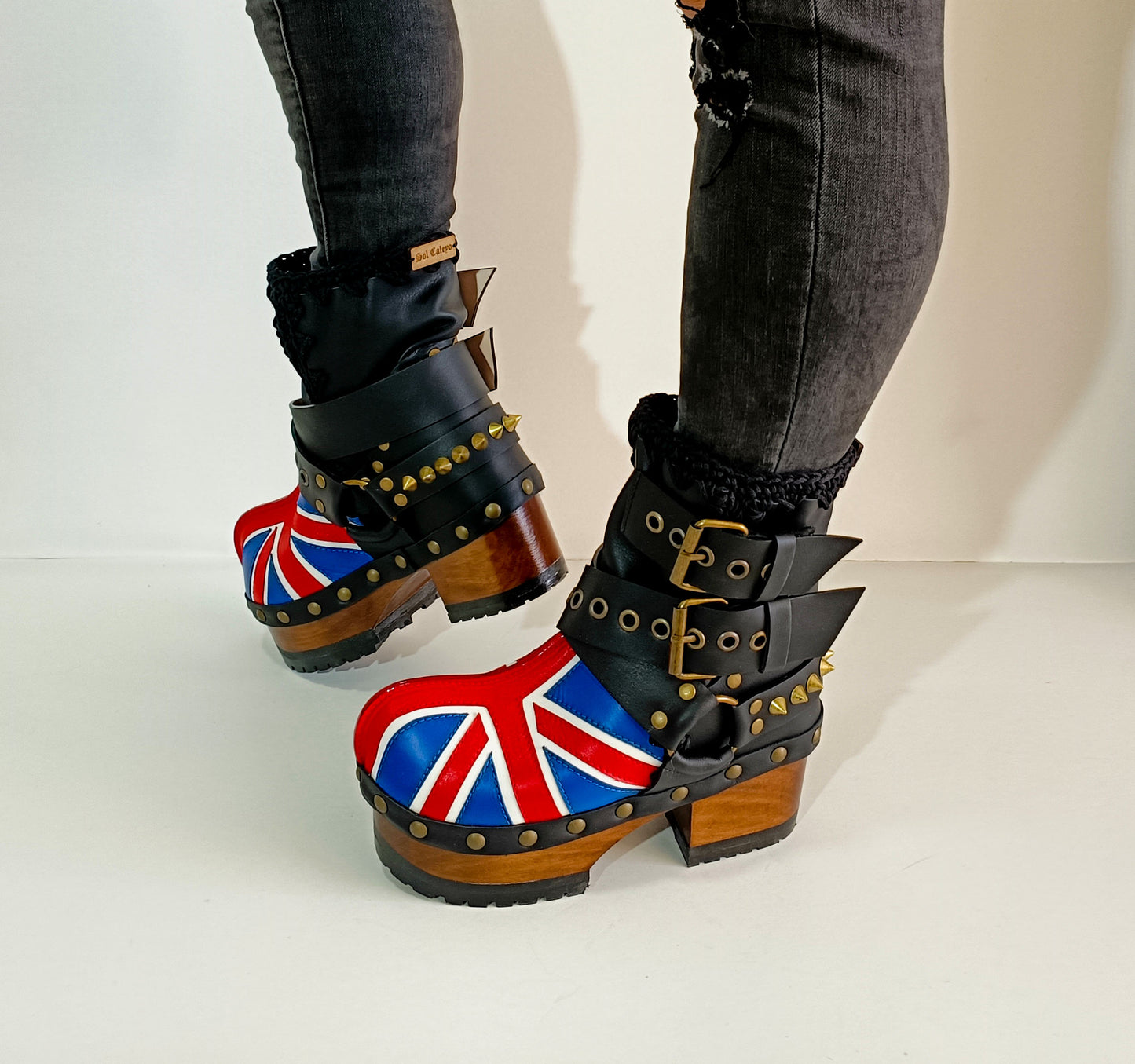 Biker style platform boots with England flag. Leather ankle boots with england flag, buckles and studs. High-end handmade footwear by Sol Caleyo.