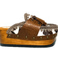 Moccasin style cowhide leather clogs, decorated with fringed laces. Moccasin style leather mules. High-end footwear handmade by Sol Caleyo.