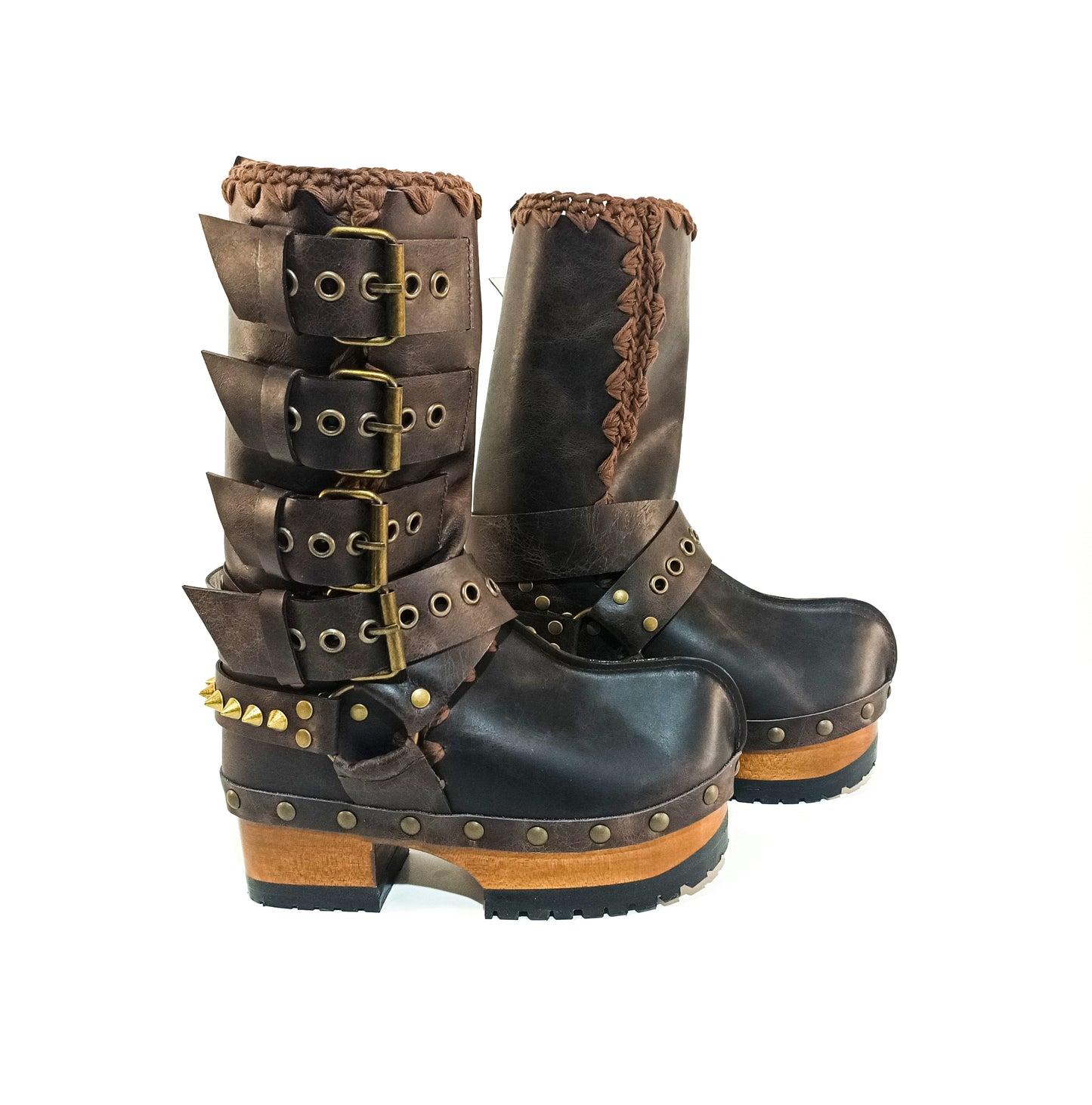 Handmade leather clogs. Dark brown leather biker boots. Leather boots with wooden heels. Leather boots with buckles. High-end footwear handmade by Sol Caleyo.