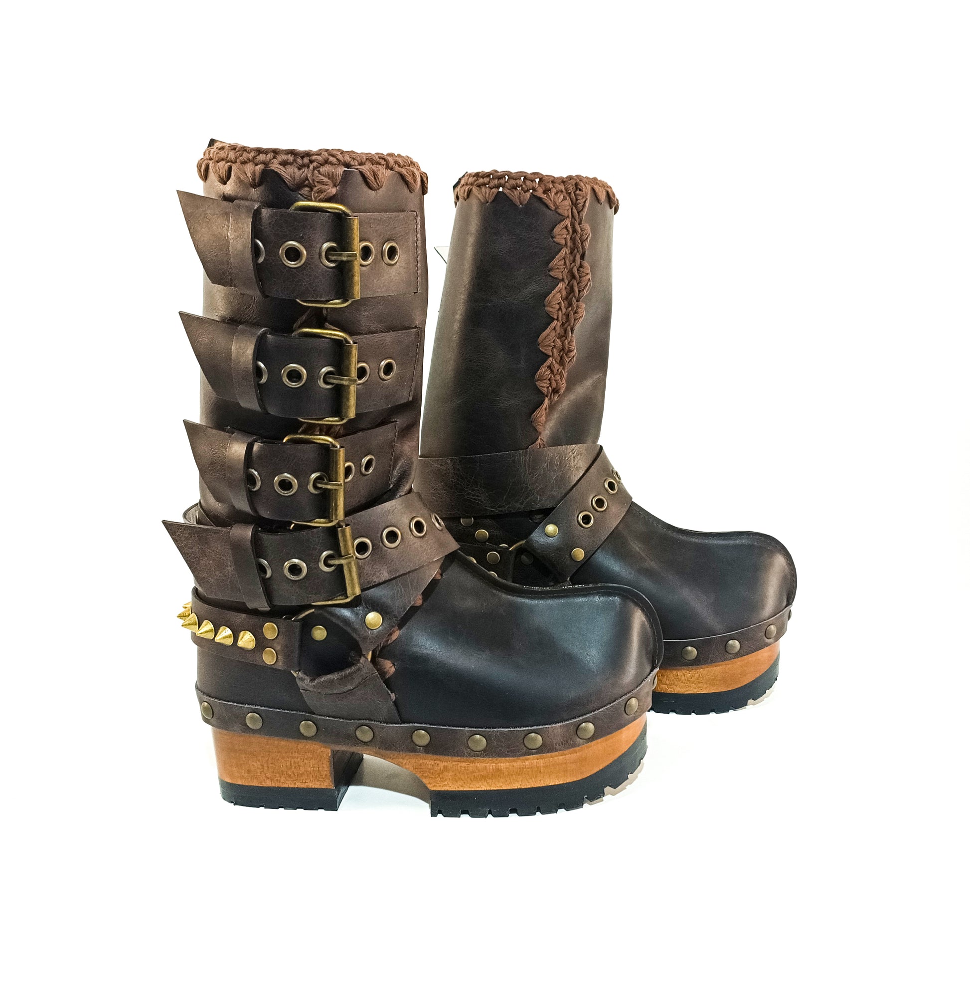Handmade leather clogs. Dark brown leather biker boots. Leather boots with wooden heels. Leather boots with buckles. High-end footwear handmade by Sol Caleyo.