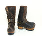 Handmade leather clogs. Dark brown leather biker boots. Leather boots with wooden heels. Leather boots with buckles. High-end footwear handmade by Sol Caleyo.