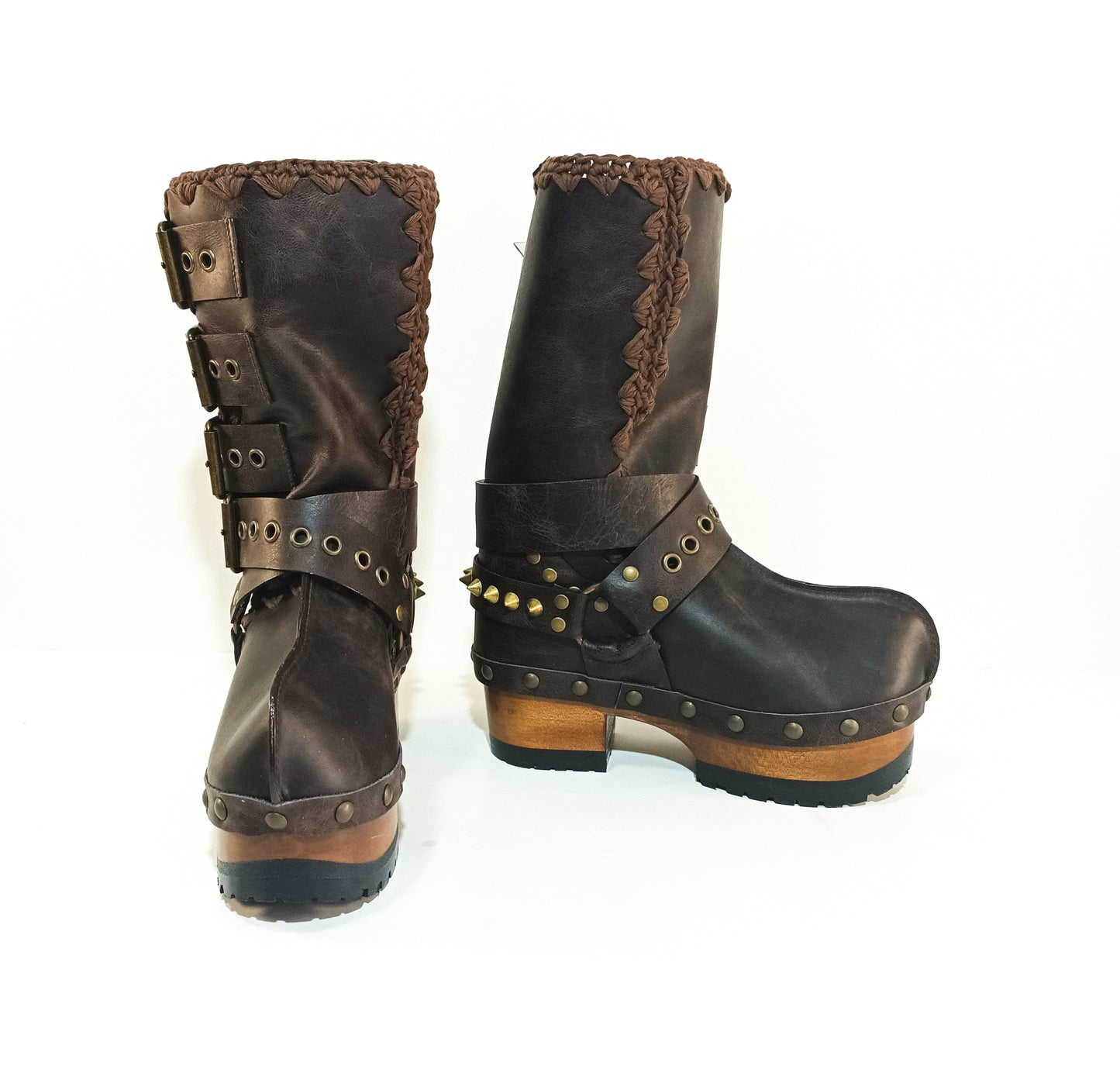Handmade leather clogs. Dark brown leather biker boots. Leather boots with wooden heels. Leather boots with buckles. High-end footwear handmade by Sol Caleyo.