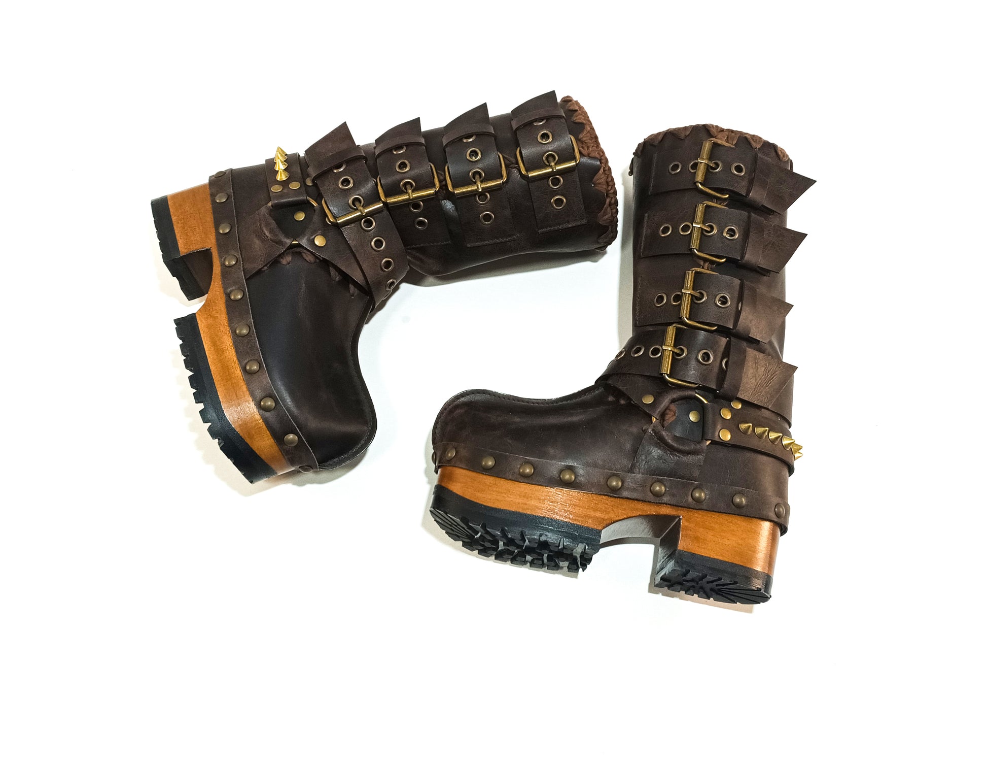 Handmade leather clogs. Dark brown leather biker boots. Leather boots with wooden heels. Leather boots with buckles. High-end footwear handmade by Sol Caleyo.