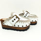 White wooden wedge clogs. White leather mules. Oxford style buckle clogs. High quality handmade shoes by Sol Caleyo.