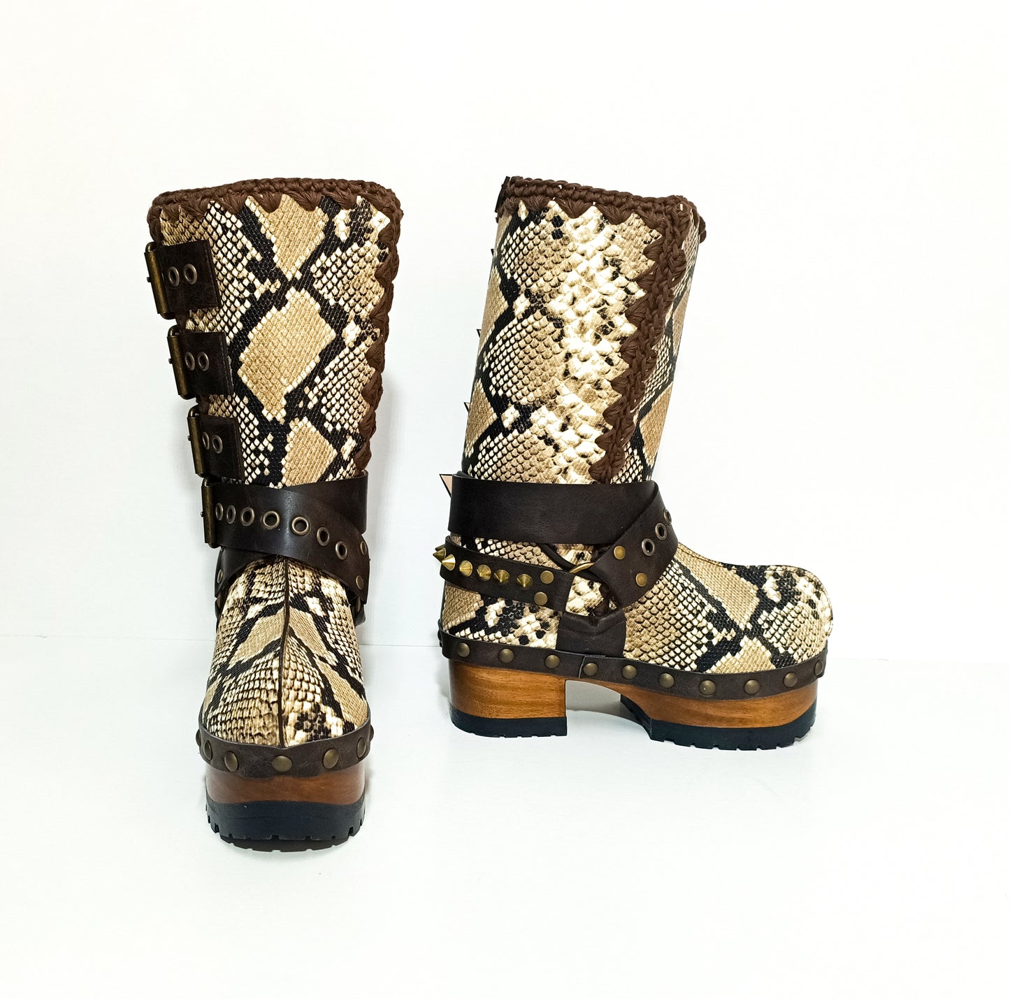 Handmade snake skin clogs. Biker-style snake boots. Leather boots with wooden heels. High-end footwear handmade by Sol Caleyo.