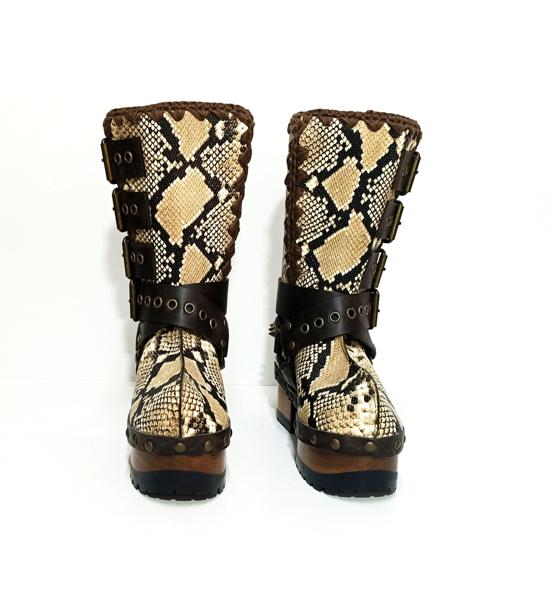 Handmade snake skin clogs. Biker-style snake boots. Leather boots with wooden heels. High-end footwear handmade by Sol Caleyo.