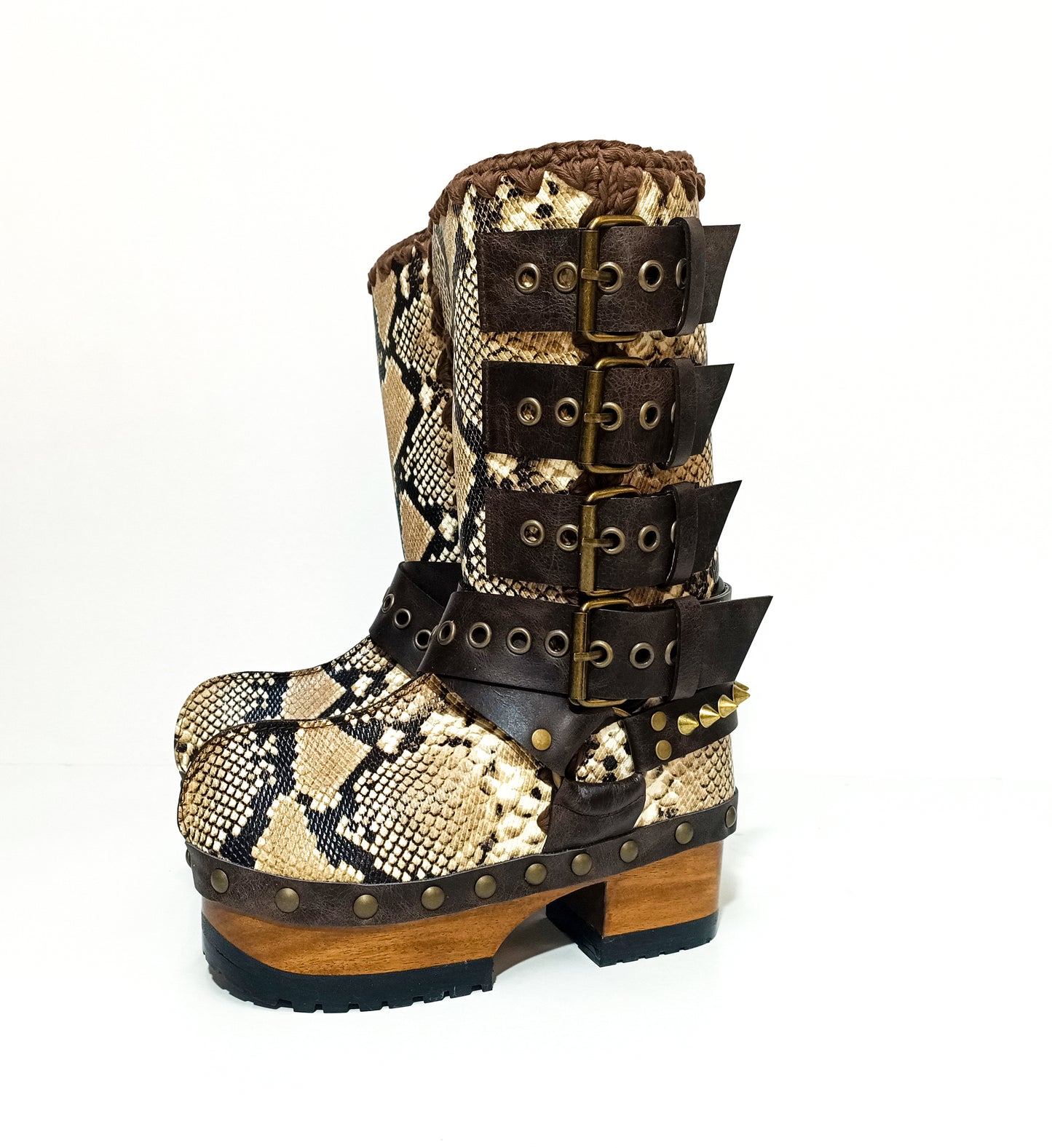 Handmade snake skin clogs. Biker-style snake boots. Leather boots with wooden heels. High-end footwear handmade by Sol Caleyo.