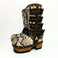 Handmade snake skin clogs. Biker-style snake boots. Leather boots with wooden heels. High-end footwear handmade by Sol Caleyo.