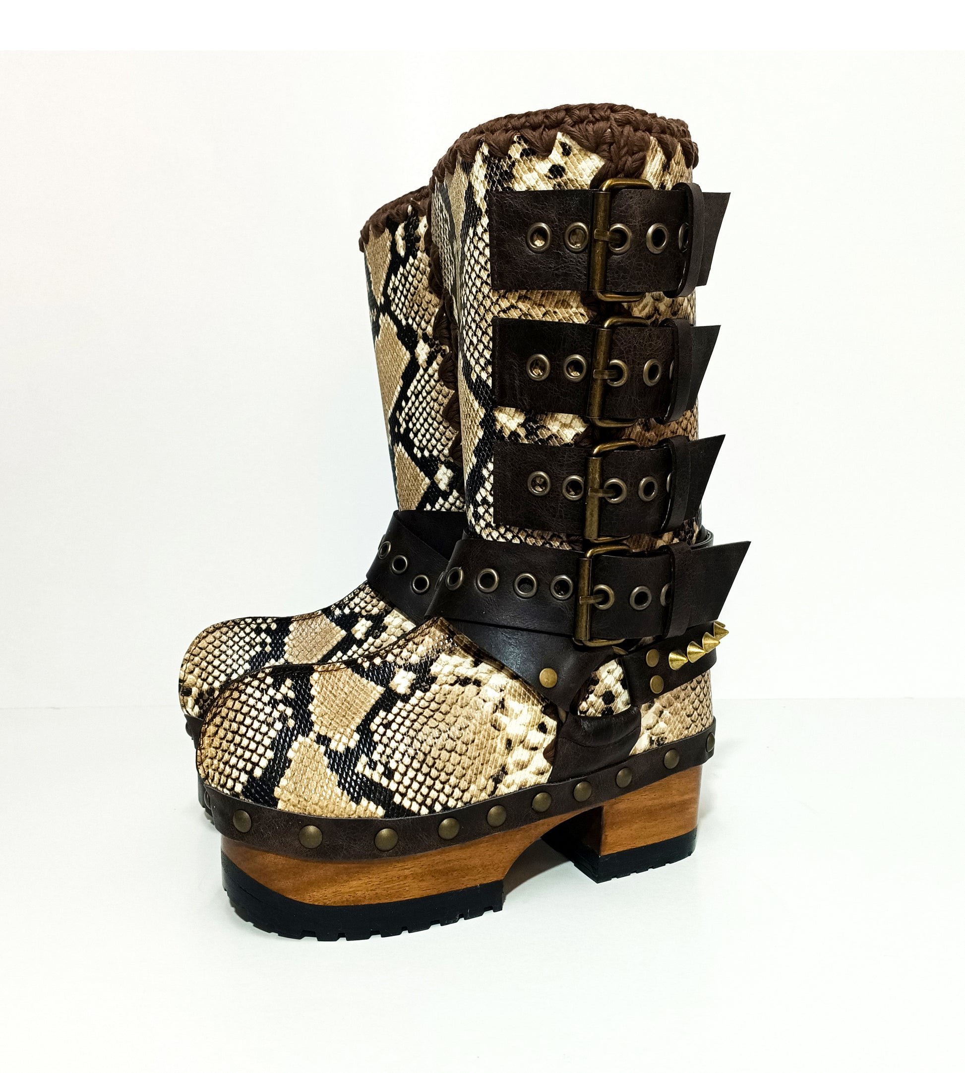 Handmade snake skin clogs. Biker-style snake boots. Leather boots with wooden heels. High-end footwear handmade by Sol Caleyo.