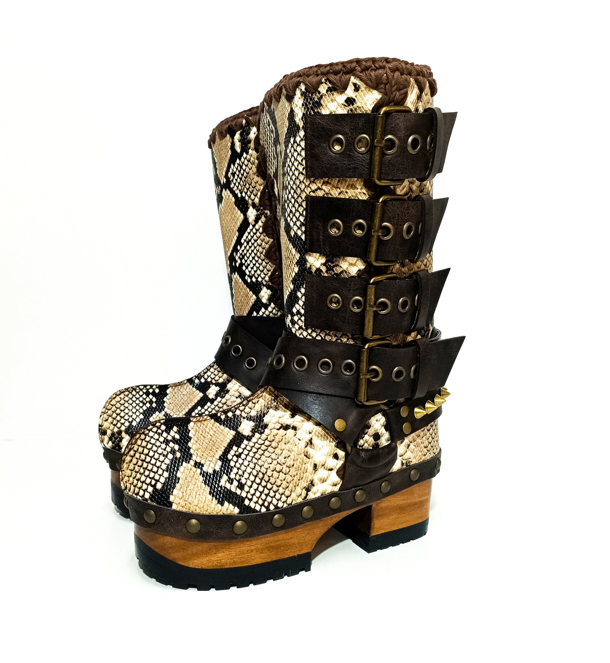 Handmade snake skin clogs. Biker-style snake boots. Leather boots with wooden heels. High-end footwear handmade by Sol Caleyo.
