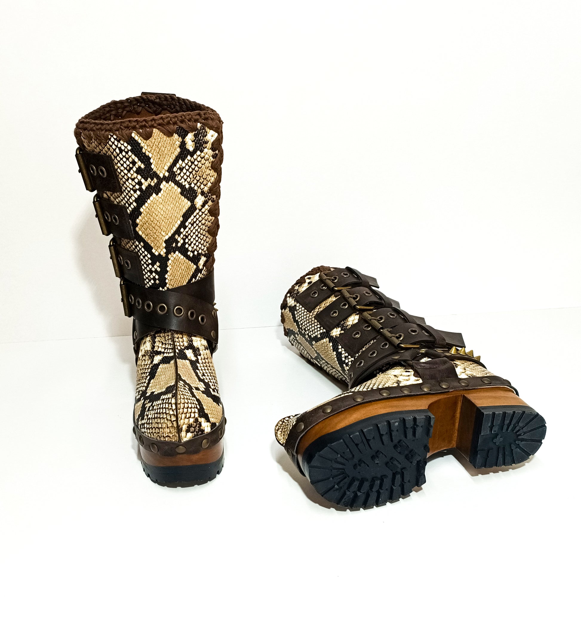 Handmade snake skin clogs. Biker-style snake boots. Leather boots with wooden heels. High-end footwear handmade by Sol Caleyo.