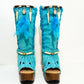 Turquoise bohemian-style boots, handmade. Platform boots with wooden heel. Turquoise bohemian-style boots decorated with feathers, shells and carved bone. High-end footwear handmade by Sol Caleyo.