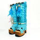 Turquoise bohemian-style boots, handmade. Platform boots with wooden heel. Turquoise bohemian-style boots decorated with feathers, shells and carved bone. High-end footwear handmade by Sol Caleyo.
