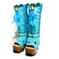 Turquoise bohemian-style boots, handmade. Platform boots with wooden heel. Turquoise bohemian-style boots decorated with feathers, shells and carved bone. High-end footwear handmade by Sol Caleyo.