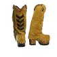 Side view of handcrafted fringe cowboy boots, camel suede leather and lacquered wooden sole with rubber grip.
