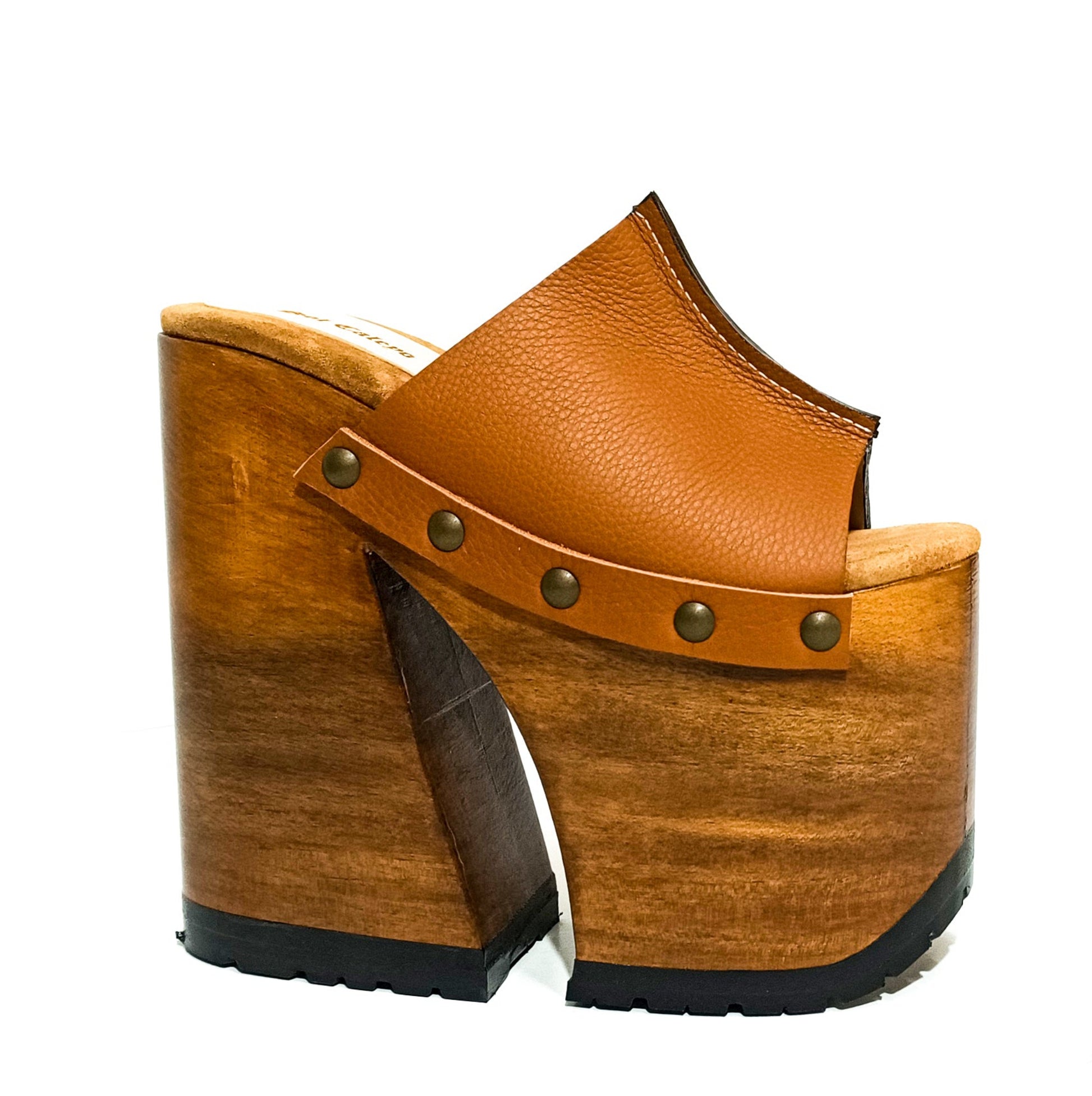 Side profile of Camel Luxury Queen Sandals by Sol Caleyo, featuring a high 17cm bell-style wooden heel, an 11cm platform, and premium camel brown leather with bronze stud detailing on a crisp white background.