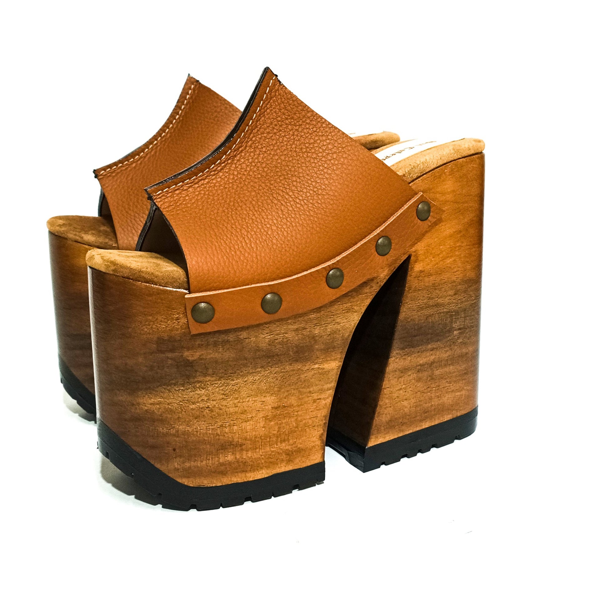 Side profile of Camel Luxury Queen Sandals by Sol Caleyo, featuring a high 17cm bell-style wooden heel, an 11cm platform, and premium camel brown leather with bronze stud detailing on a crisp white background.