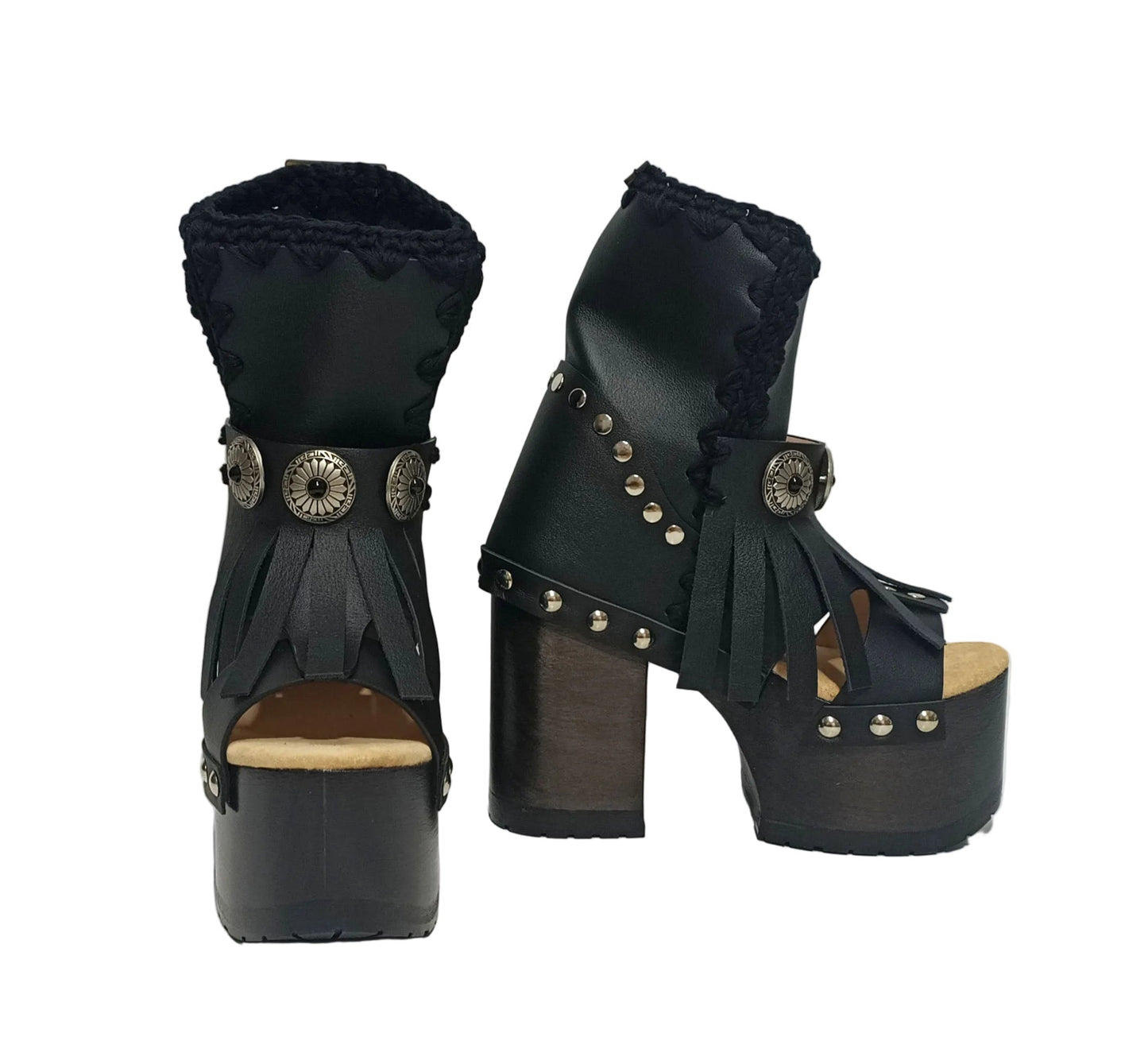 Sol Caleyo handmade platform sandals in genuine full-grain leather with wood sole and 12cm heel. Featuring silver conchos, black stones, and tractor rubber sole. Bohemian luxury footwear.