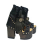 Sol Caleyo handmade platform sandals in genuine full-grain leather with wood sole and 12cm heel. Featuring silver conchos, black stones, and tractor rubber sole. Bohemian luxury footwear.
