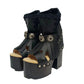 Sol Caleyo handmade platform sandals in genuine full-grain leather with wood sole and 12cm heel. Featuring silver conchos, black stones, and tractor rubber sole. Bohemian luxury footwear.