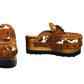 Oxford Clogs Cowhide Print by Sol Caleyo: handmade wooden platform clogs with cowhide hair-on leather, crochet trim, and aged camel leather strap.