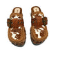 Oxford Clogs Cowhide Print by Sol Caleyo: handmade wooden platform clogs with cowhide hair-on leather, crochet trim, and aged camel leather strap.