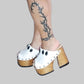 White leather sandal. White leather sandal boho style. White leather sandal decorated with fringes and silver conchos with a unique boho style. Wooden clog sandals with super high heels 70's style. Sizes 34 to 47. High quality handmade leather shoes by sol Caleyo. Sustainable fashion.