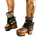 Flip-flop style boot. Biker-style snake boot. Snake boot with wooden heel. Platform flip-flop. High-end leather footwear handmade by Sol Caleyo.