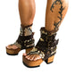 Flip-flop style boot. Biker-style snake boot. Snake boot with wooden heel. Platform flip-flop. High-end leather footwear handmade by Sol Caleyo.