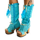 Turquoise bohemian-style boots, handmade. Platform boots with wooden heel. Turquoise bohemian-style boots decorated with feathers, shells and carved bone. High-end footwear handmade by Sol Caleyo.