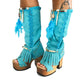 Turquoise bohemian-style boots, handmade. Platform boots with wooden heel. Turquoise bohemian-style boots decorated with feathers, shells and carved bone. High-end footwear handmade by Sol Caleyo.
