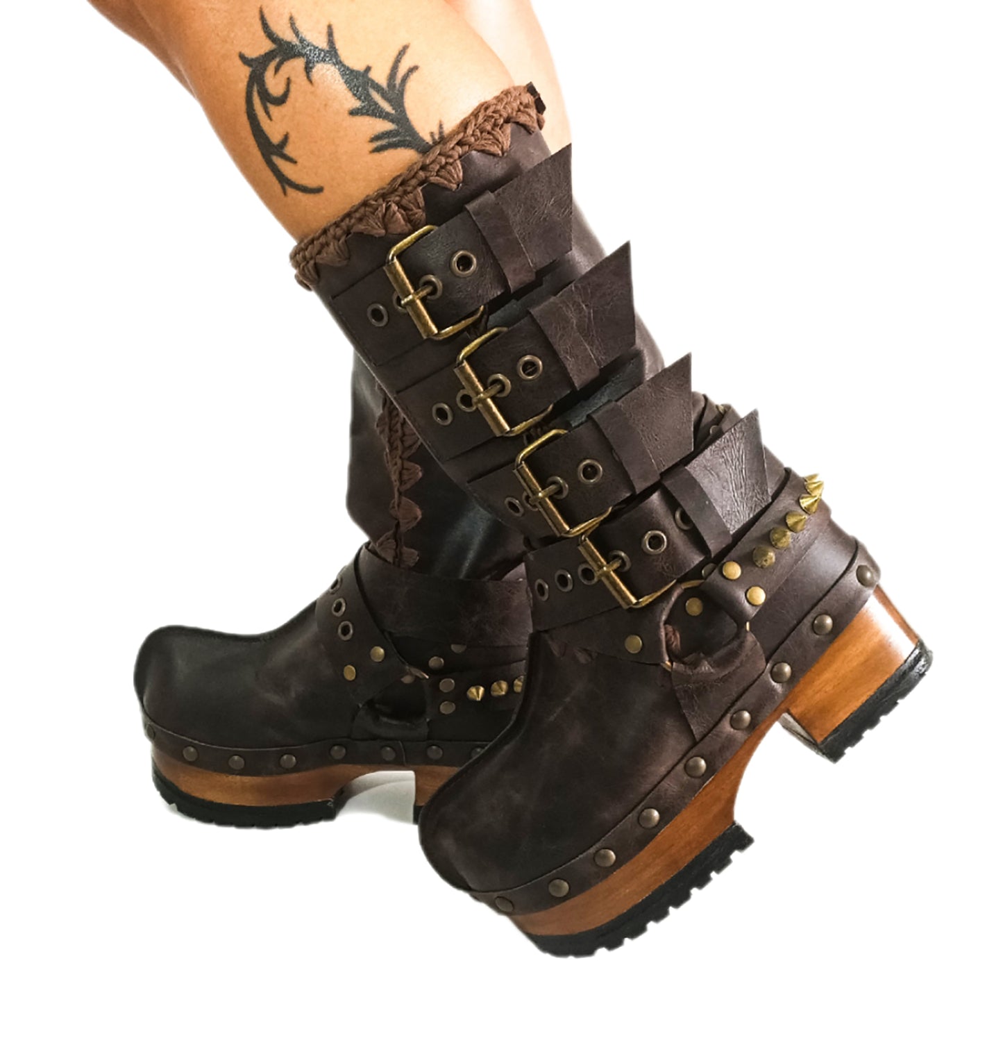 Handmade leather clogs. Dark brown leather biker boots. Leather boots with wooden heels. Leather boots with buckles. High-end footwear handmade by Sol Caleyo.