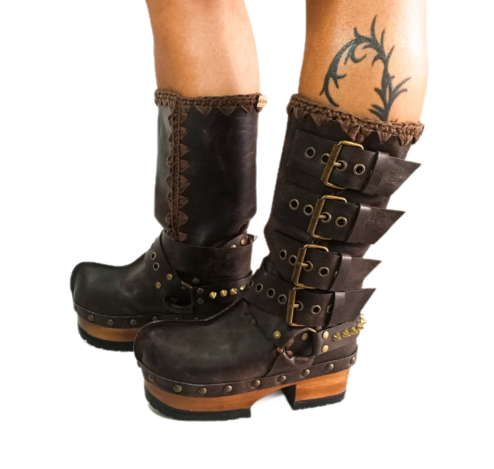 Handmade leather clogs. Dark brown leather biker boots. Leather boots with wooden heels. Leather boots with buckles. High-end footwear handmade by Sol Caleyo.