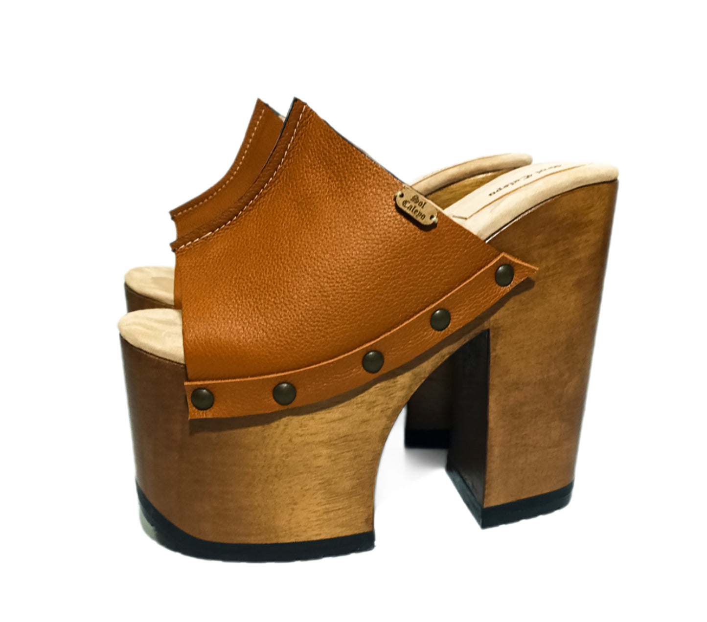 Platform sandals with super high heels. Super high wooden heel. Leather sandal with super high wooden heel. Sizes 34 to 47. Queen sandals are an exclusive design by Sol Caleyo.