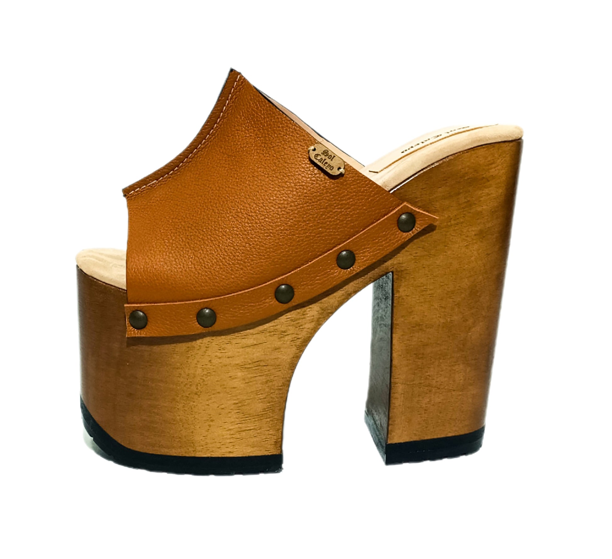 Platform sandals with super high heels. Super high wooden heel. Leather sandal with super high wooden heel. Sizes 34 to 47. Queen sandals are an exclusive design by Sol Caleyo.