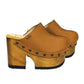 Brown leather clogs in a vintage 70s style. Super high vintage-style wooden heel. Sizes 33 to 47. High-end footwear handmade by Sol Caleyo.