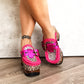 Handmade metallic leopard print and fuchsia leather mule clogs with old-gold buckle, studs and 9 cm wooden heel by Sol Caleyo.