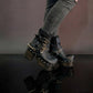 Black leather platform boots with silver studs. Black leather biker style boots with buckles. Black leather ankle boots with vintage style buckles. Leather boots with wooden heel. High-end handmade footwear by Sol Caleyo.