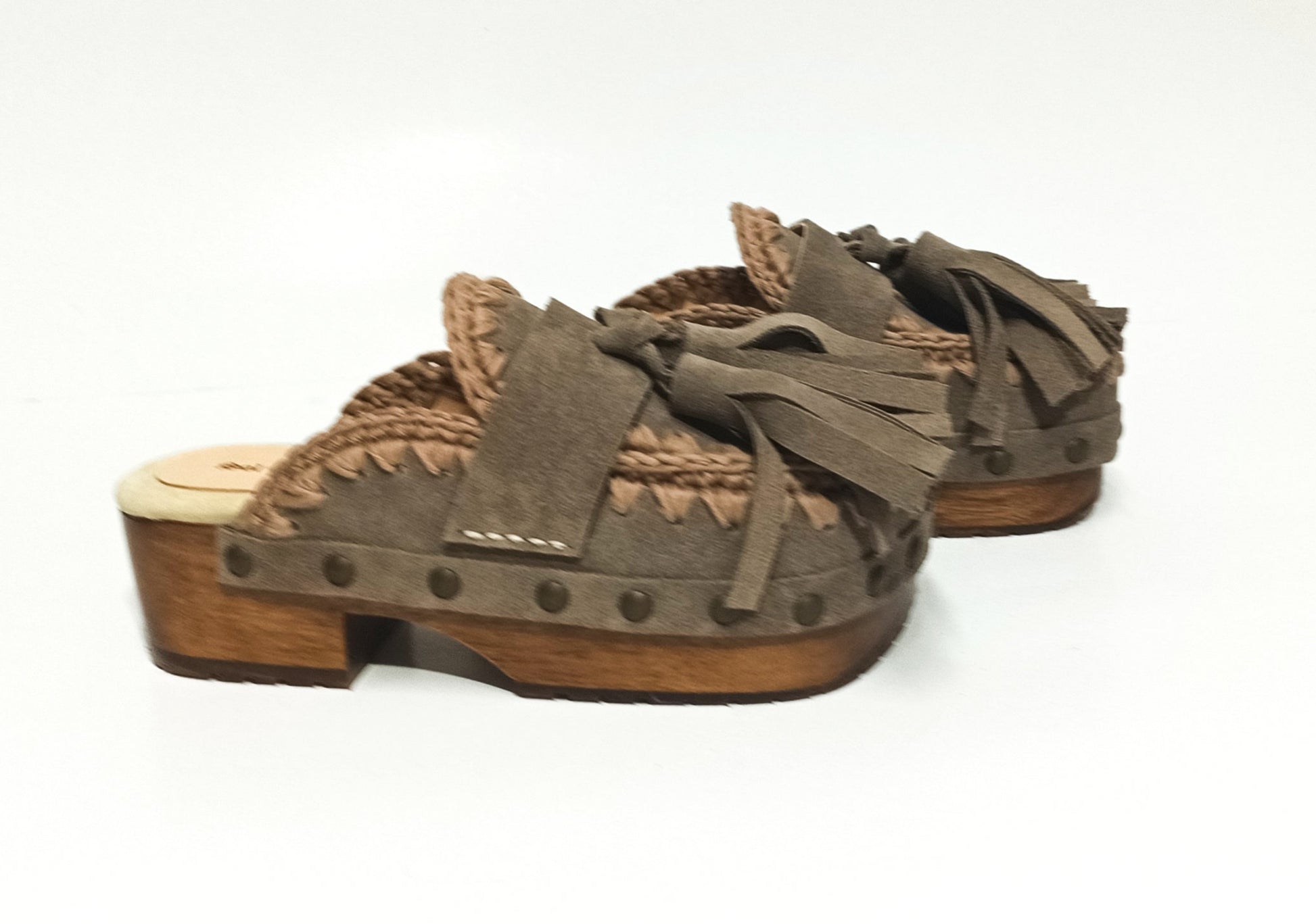Sol Caleyo Artemisa Earth Tone Suede Tassel Clogs side view on white background