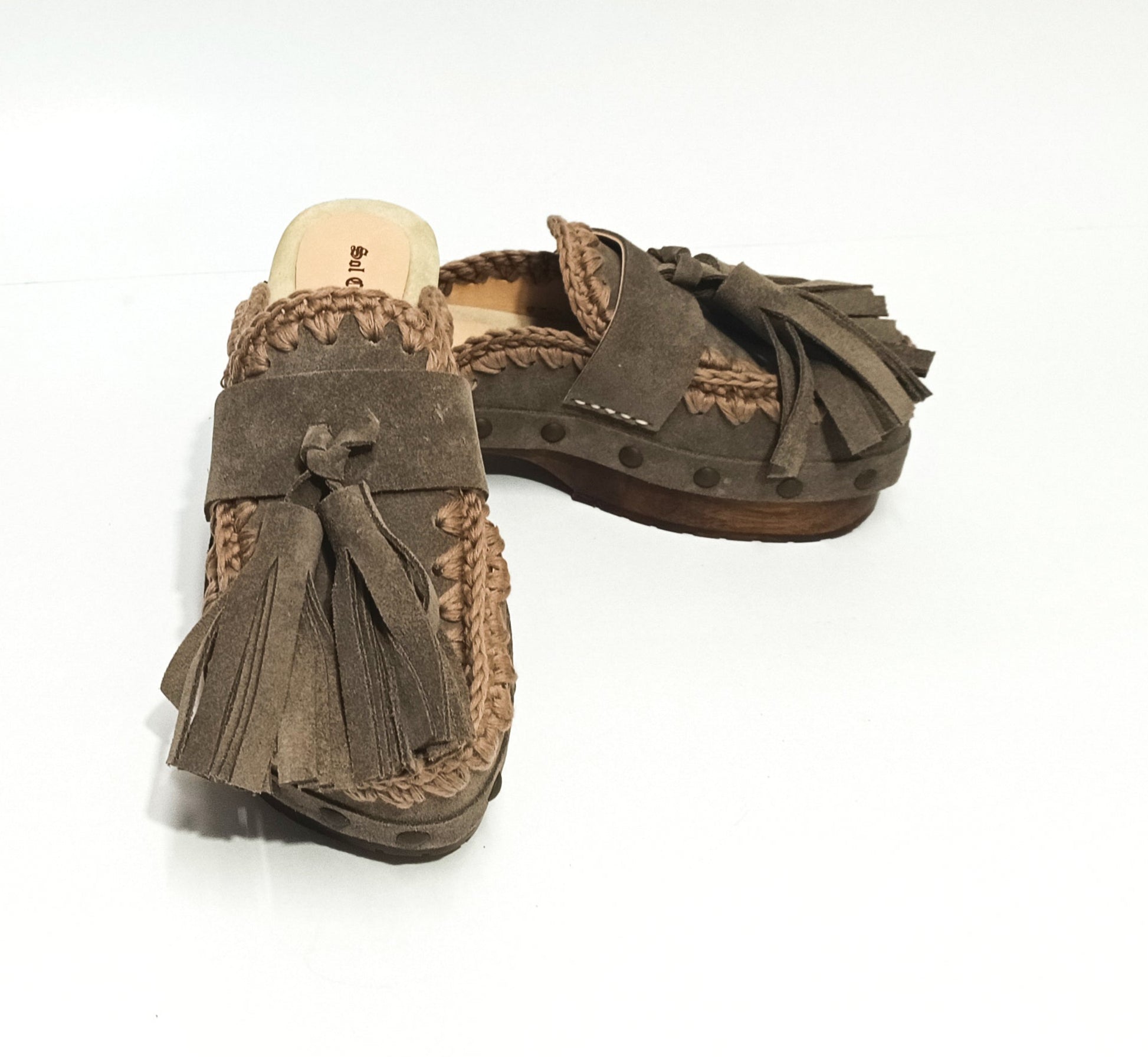 Sol Caleyo Artemisa Earth Tone Suede Tassel Clogs side view on white background