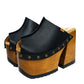 Black leather clogs in a vintage 70s style. Super high vintage-style wooden heel. Sizes 33 to 47. High-end footwear handmade by Sol Caleyo.