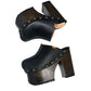 Black leather clogs with platform and super high heel. Leather mule with super high wooden heel. Black leather clogs 70's vintage style. Vintage style super high heel clogs. Sizes 34 to 47. High quality leather shoes handmade by sol Caleyo. Sustainable fashion.