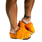 Handmade orange metallic leather closed-toe platform mule clogs with orange rabbit fur, wool-knit edge and 6 cm natural lacquered wooden heel by Sol Caleyo.