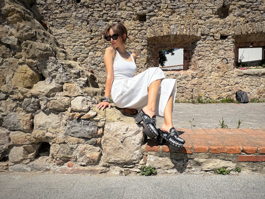 Zebra leather mules with wooden heels. Zebra clogs made from premium quality leather. High-end footwear handmade by Sol Caleyo.