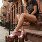 Pink metallic fuchsia handmade leather platform sandals with old-gold studs and 17 cm hand-carved wooden heel by Sol Caleyo.