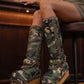 Handmade genuine leather military print combat boots with wooden platform, chains, and bronze studs by Sol Caleyo.