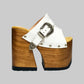 Individually handcrafted White Western Sandals showing the 17cm hand-carved wooden platform and ornate silver buckle on a white background.