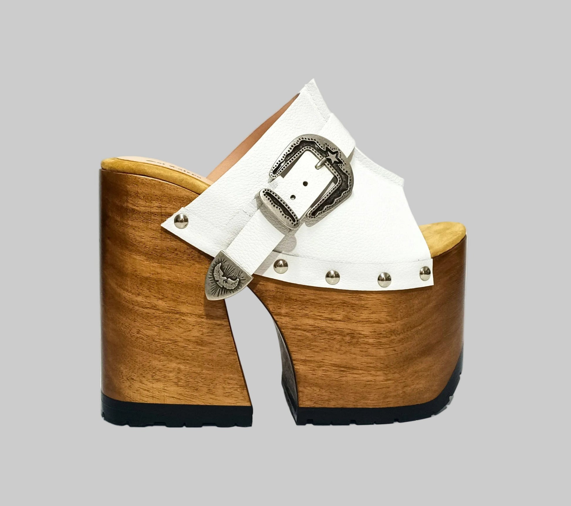 Individually handcrafted White Western Sandals showing the 17cm hand-carved wooden platform and ornate silver buckle on a white background.